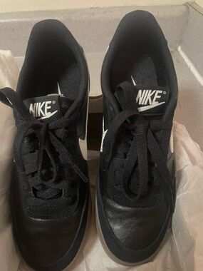 Nike Black Sneakers with White Swoosh